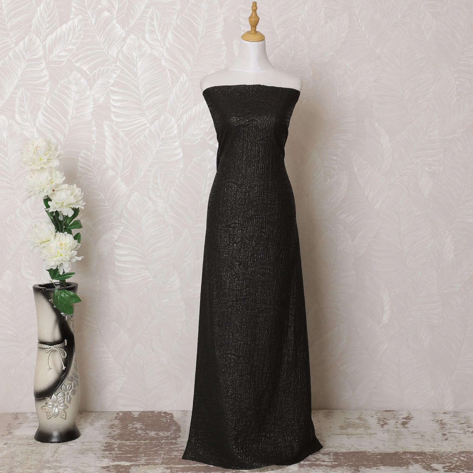 Black synthetic stretchable brocade fabric with same gold metallic shine in self design-D15983